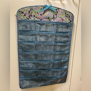 Hanging pockets jewelry holder